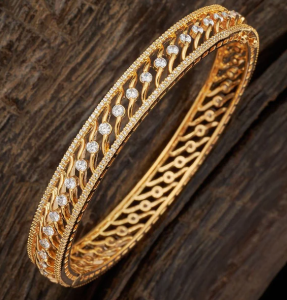 gold bangle with stones